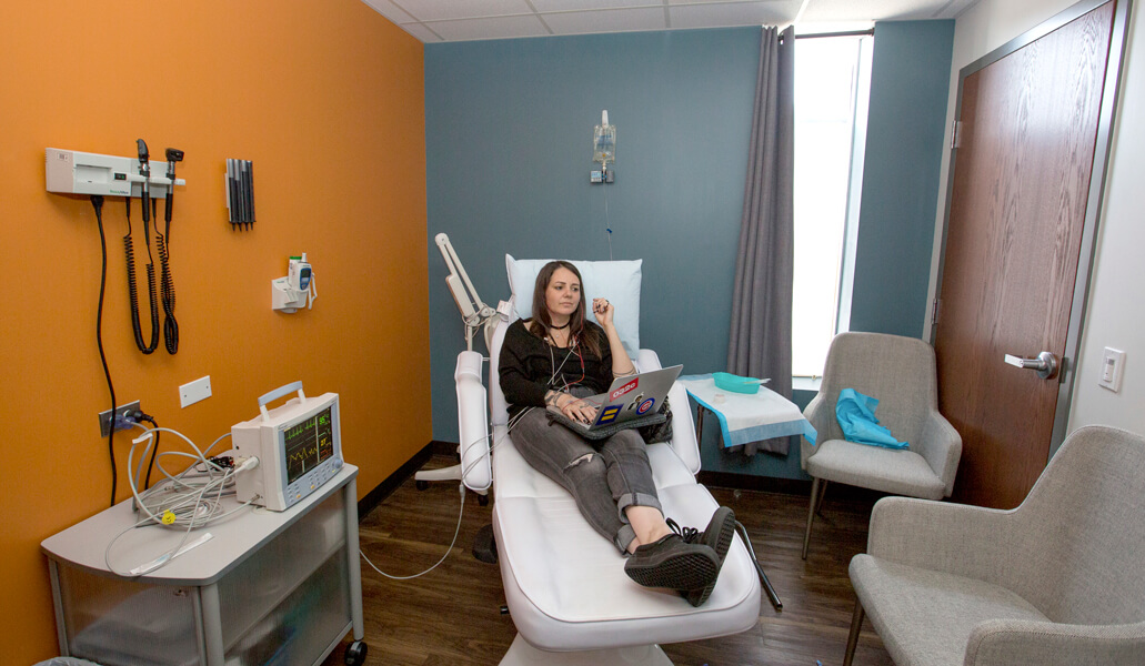 A photo shows a woman as she receives an infusion of the drug ketamine during a 45-minute session at an outpatient clinic in Chicago on July 25, 2018. She struggled with depression and anxiety and made several suicide attempts before starting ketamine treatments earlier in the year.