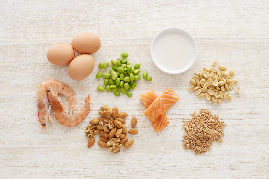 Photograph of eight small piles of allergenic foods.